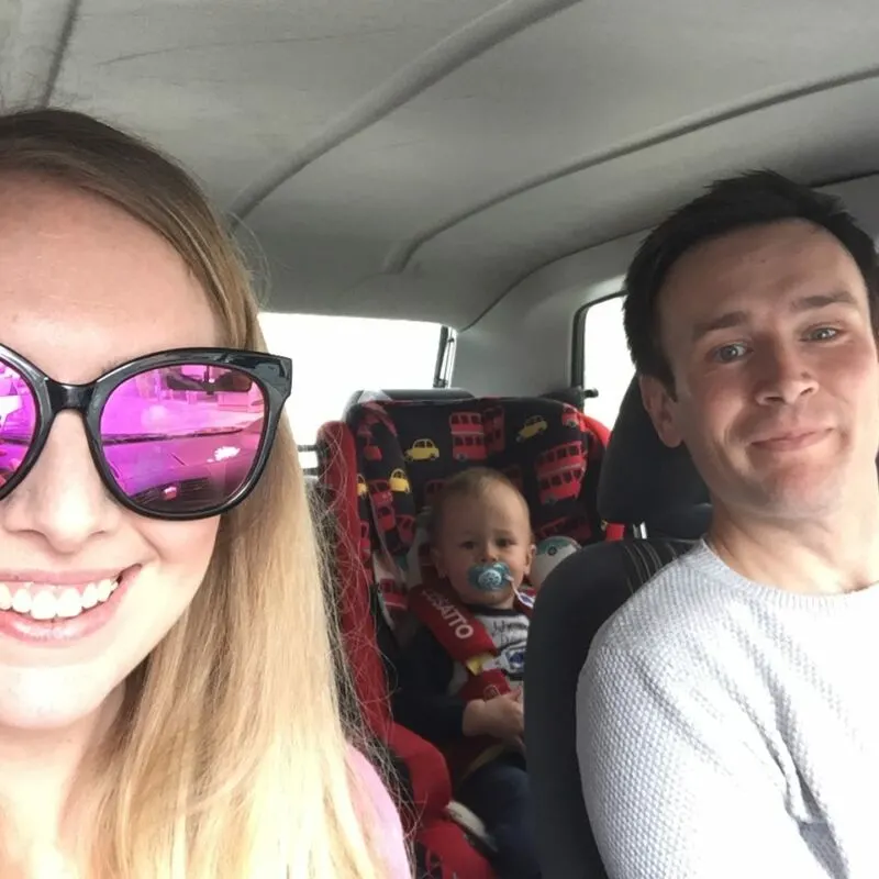 me in the driving seat, my husband in the passenger seat and dexter in the back of the car in his forward facing car seat. why we use a forward facing car seat