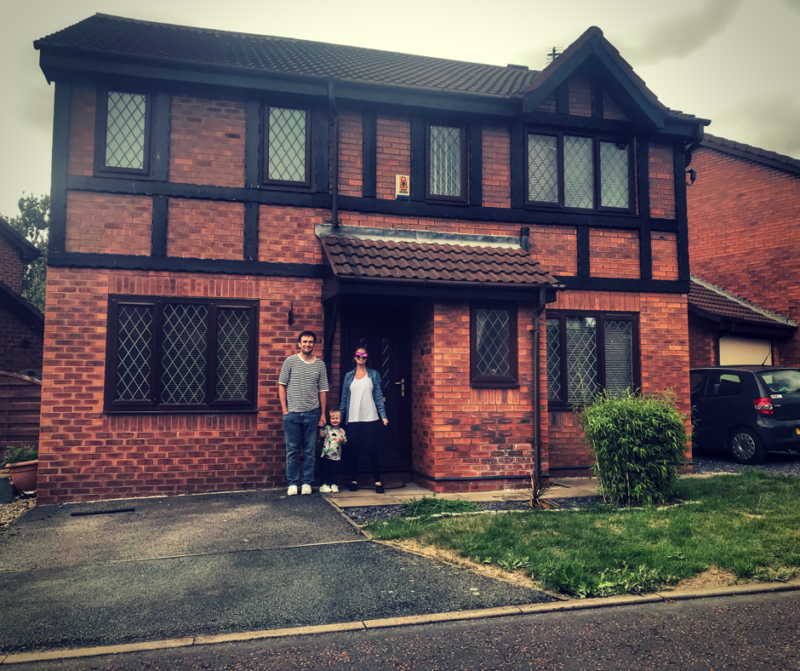 myself, neil and dexter stood outside our house the day we moved in