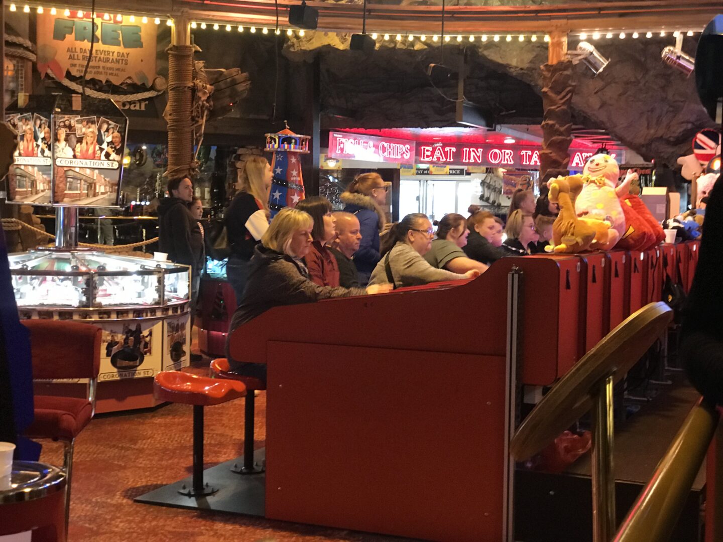 The general public playing the camel Derby in Coral Island, Blackpool