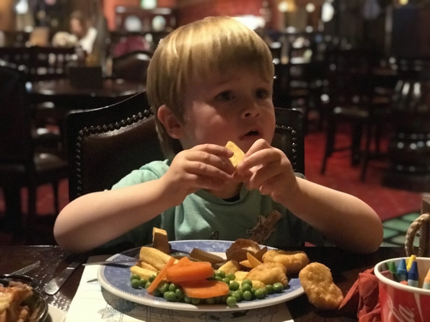 Dexter eating chicken nuggets, chips and veg in the buccaneer, blackpool