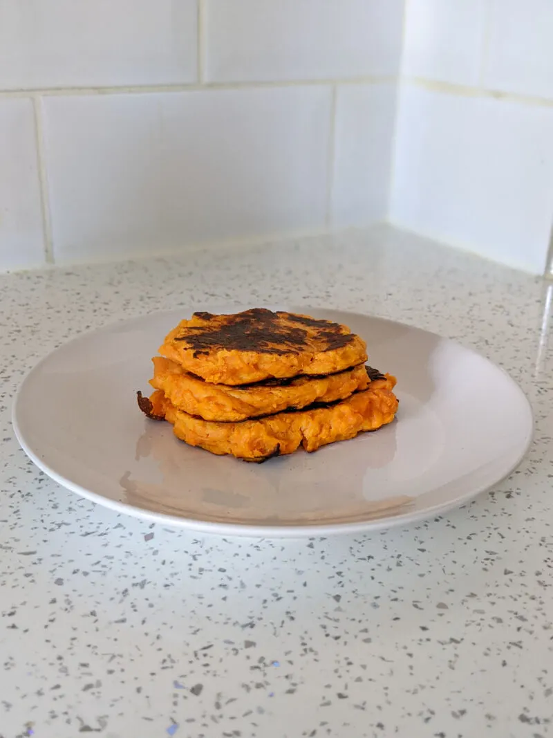 Sweet potato pancakes on a white plate