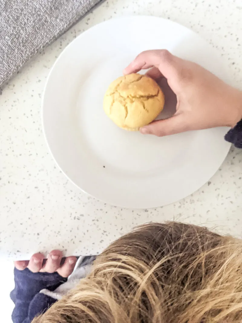 Dexter reaching for baby led weaning pumpkin muffin