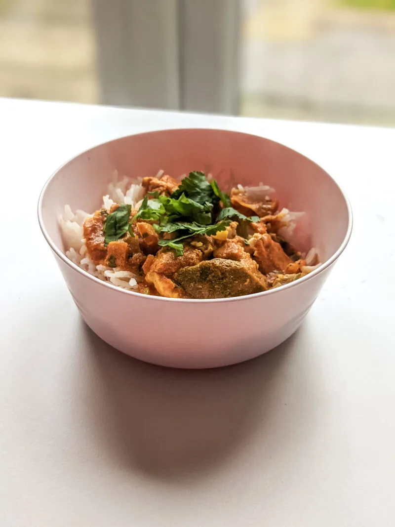 Baby curry in pink bowl