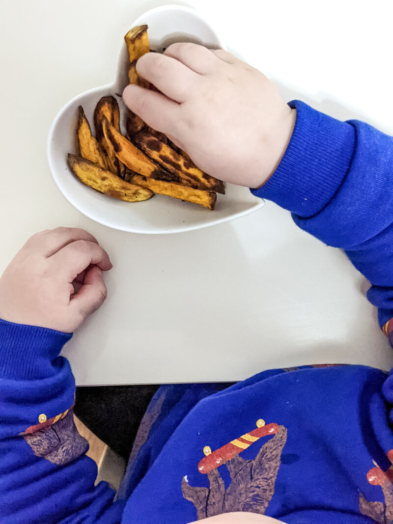 felix eating baby led weaning sweet potato fries