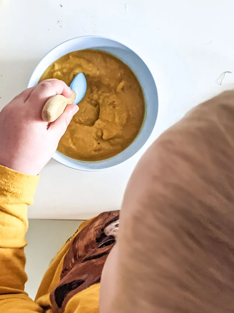 Felix eating sweet potato soup for babies