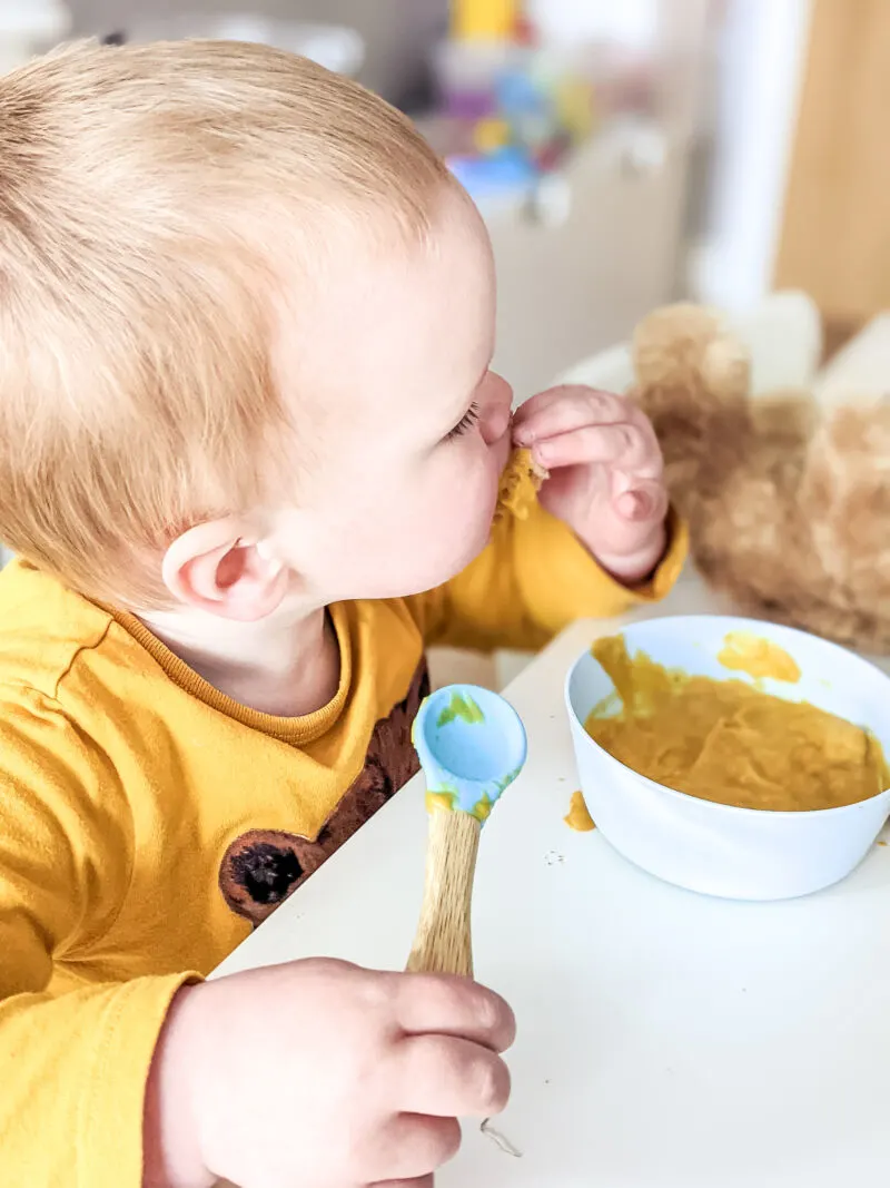 felix eating bread that's been dipped into the soup