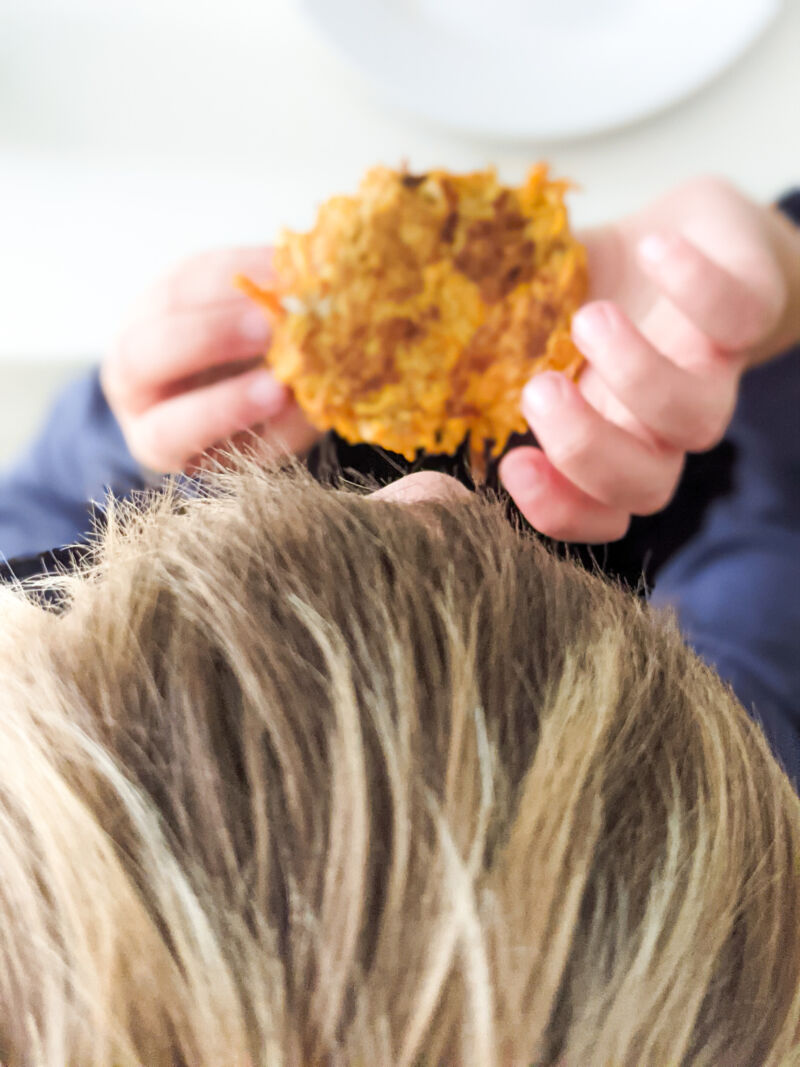 dexter eating sweet potato fritters