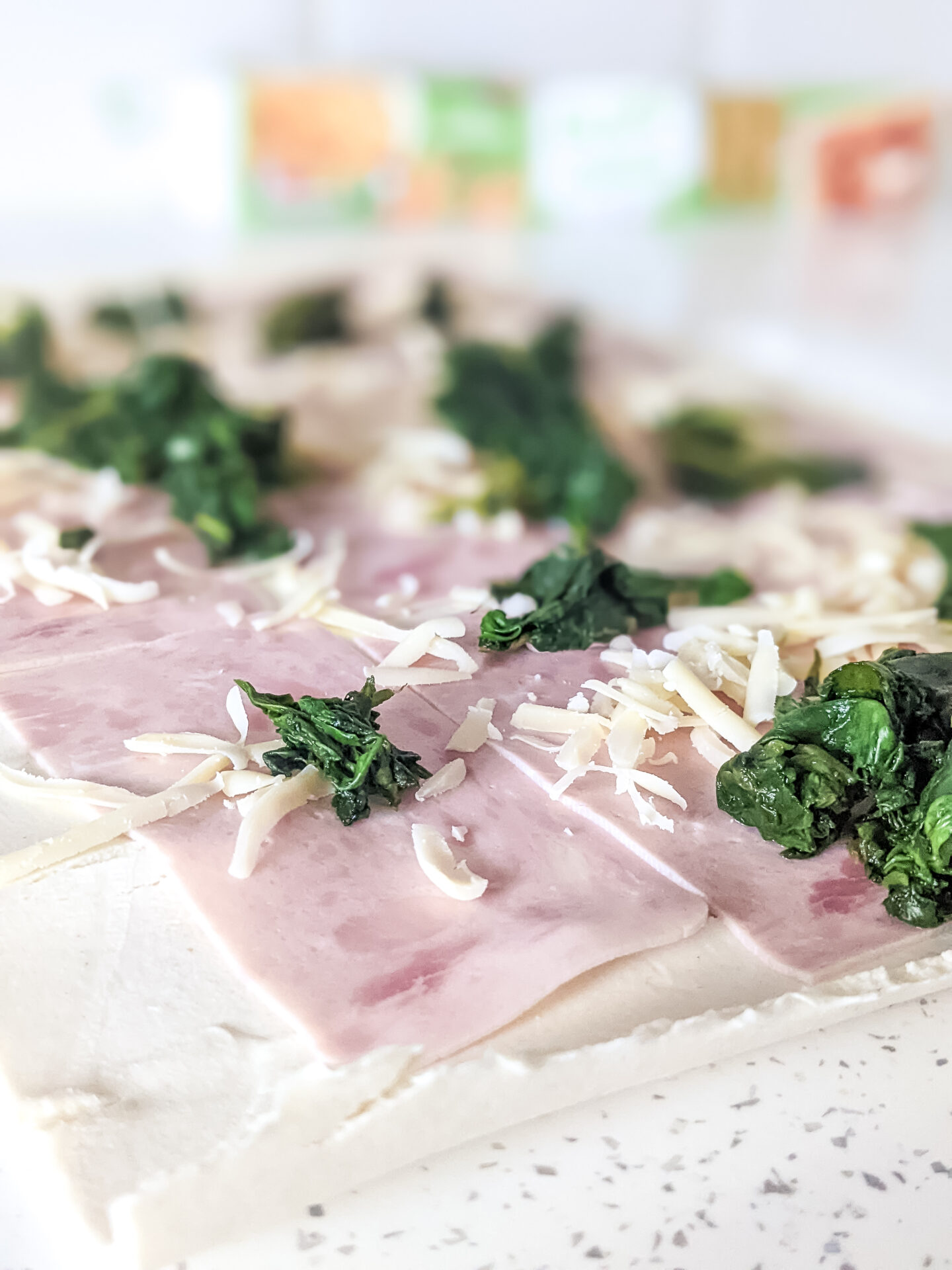 puff pastry laid out with toppings on top ready to make the pinwheels for baby