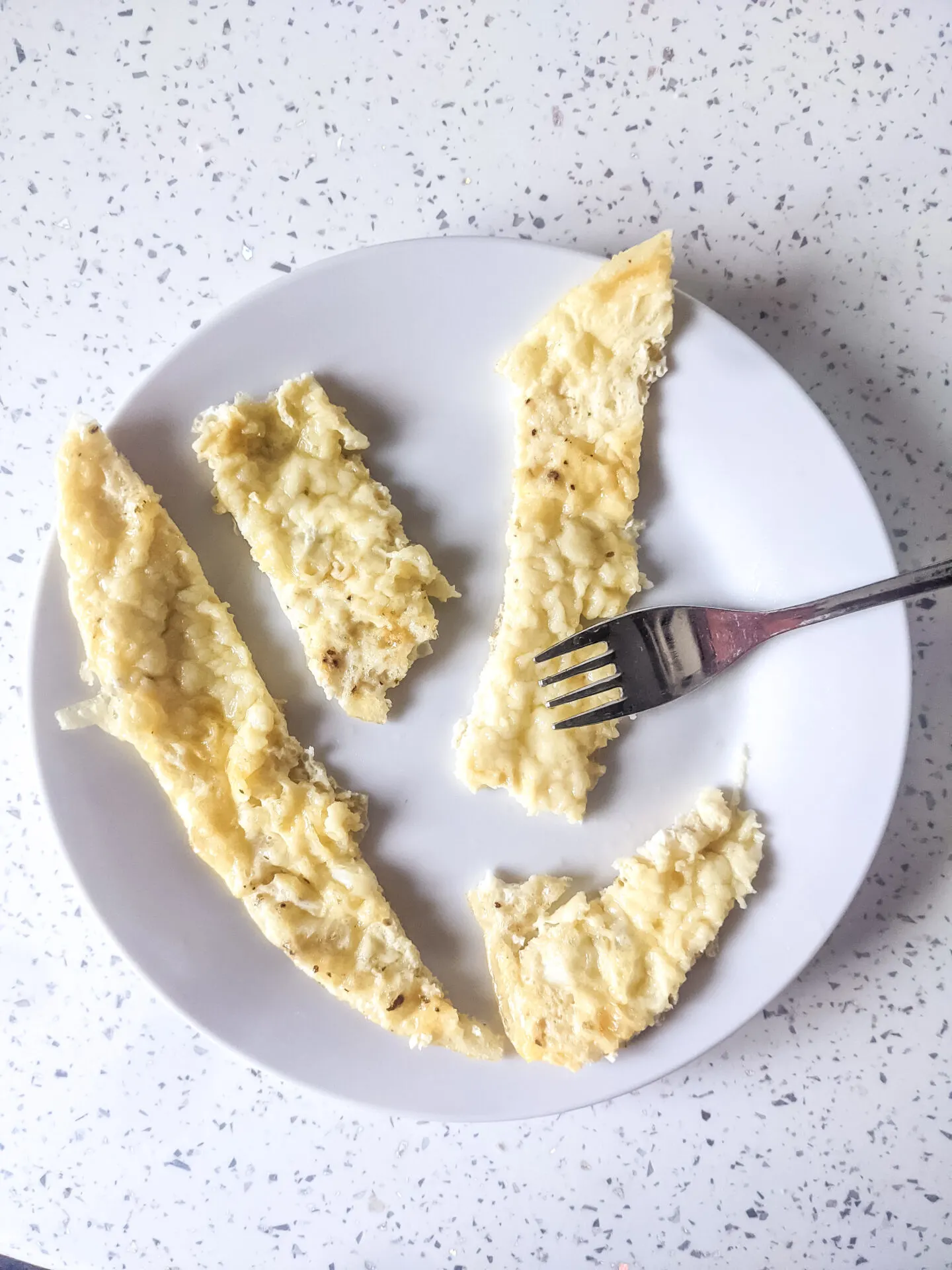 baby led weaning omelette on the plate with a fork