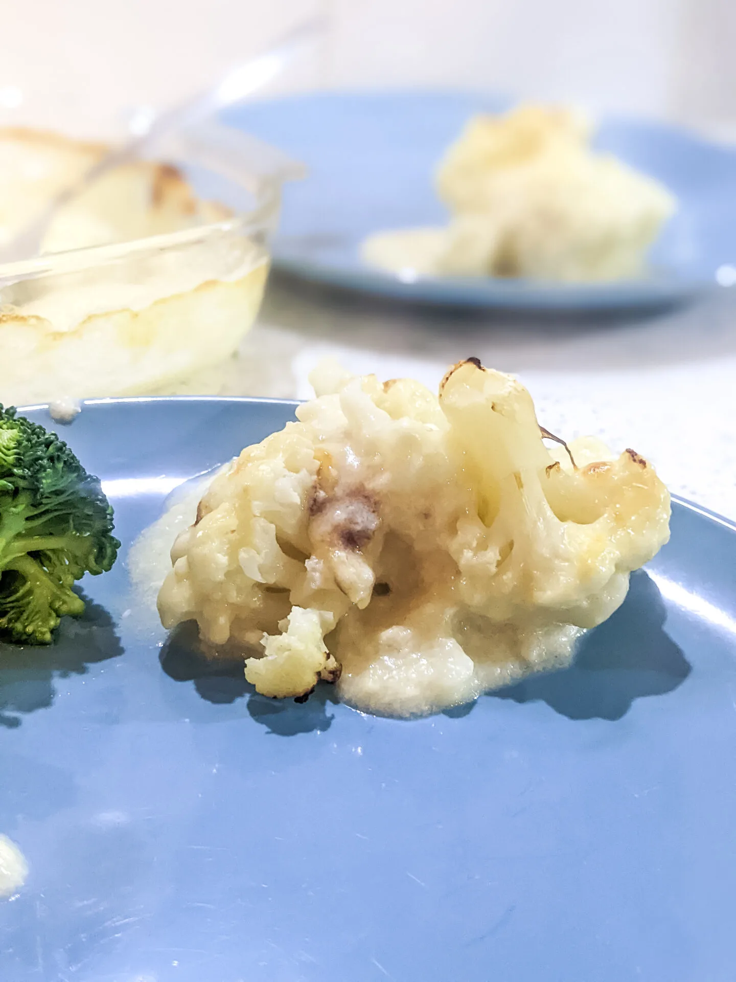 cauliflower cheese on a plate ready to be served