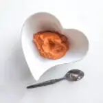 sweet potato mash for babies in a heart shaped bowl