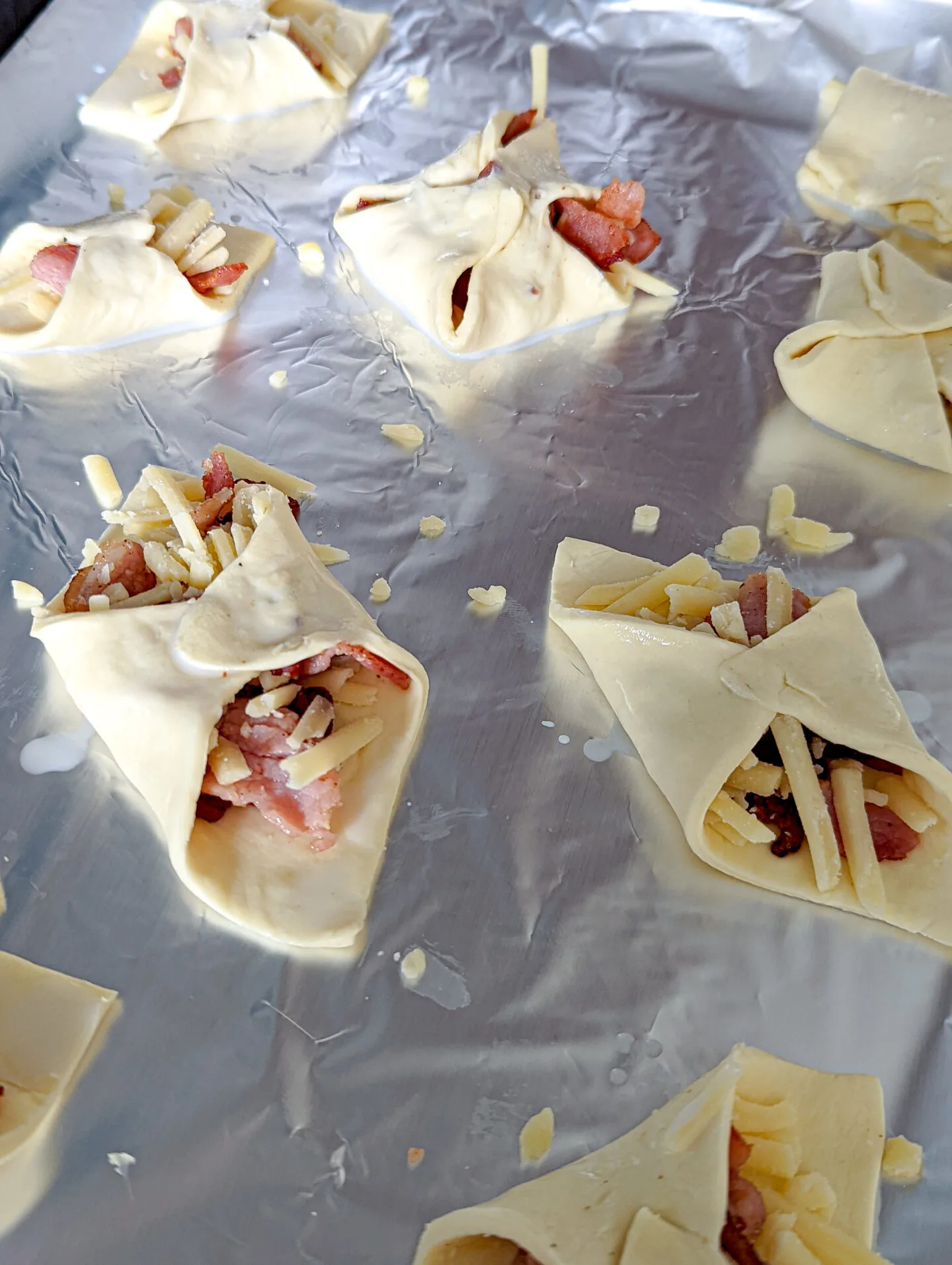 cheese and bacon puffs wrapped and ready for the oven