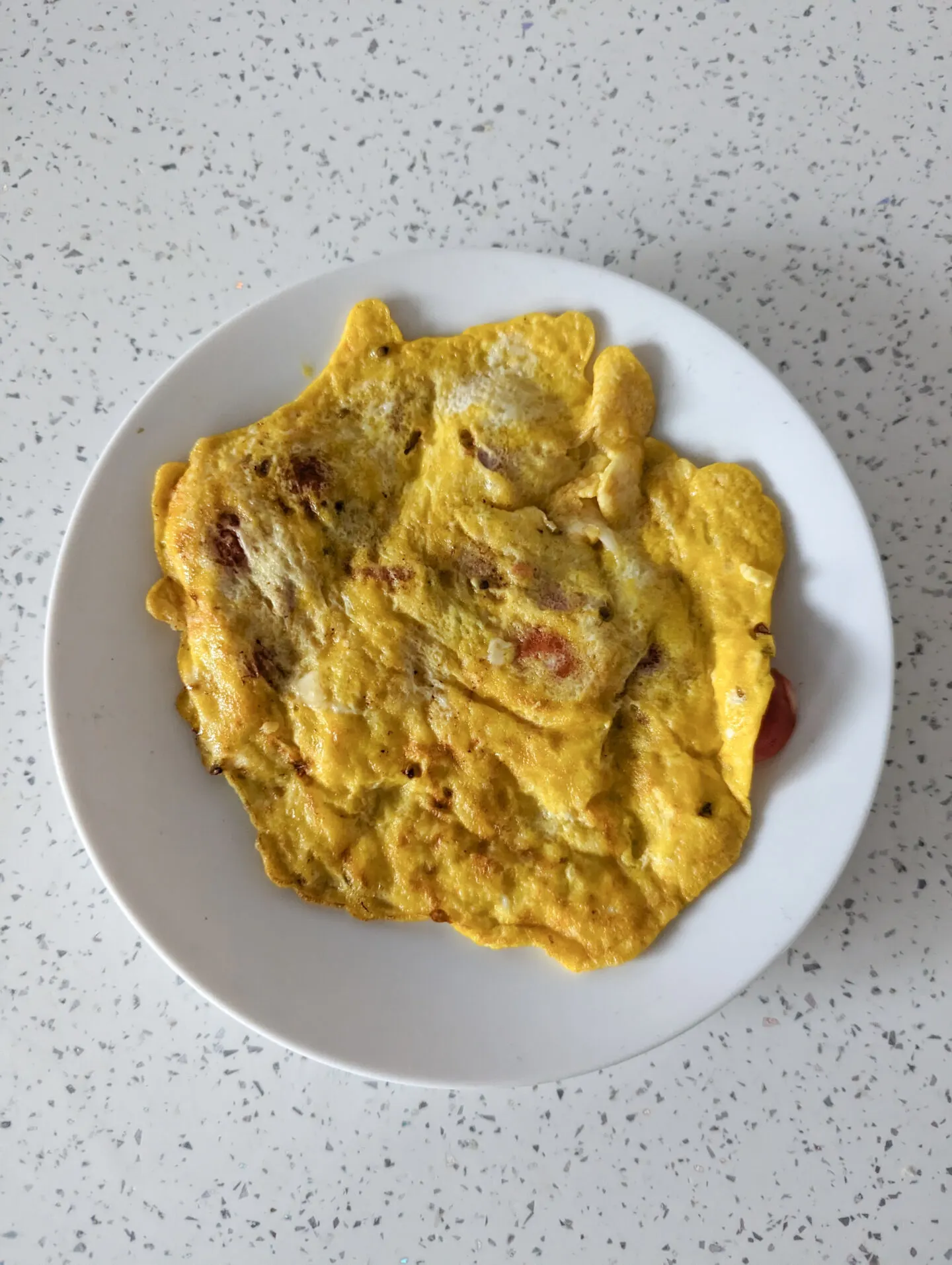 cheese and tomato omelette for babies on a plate