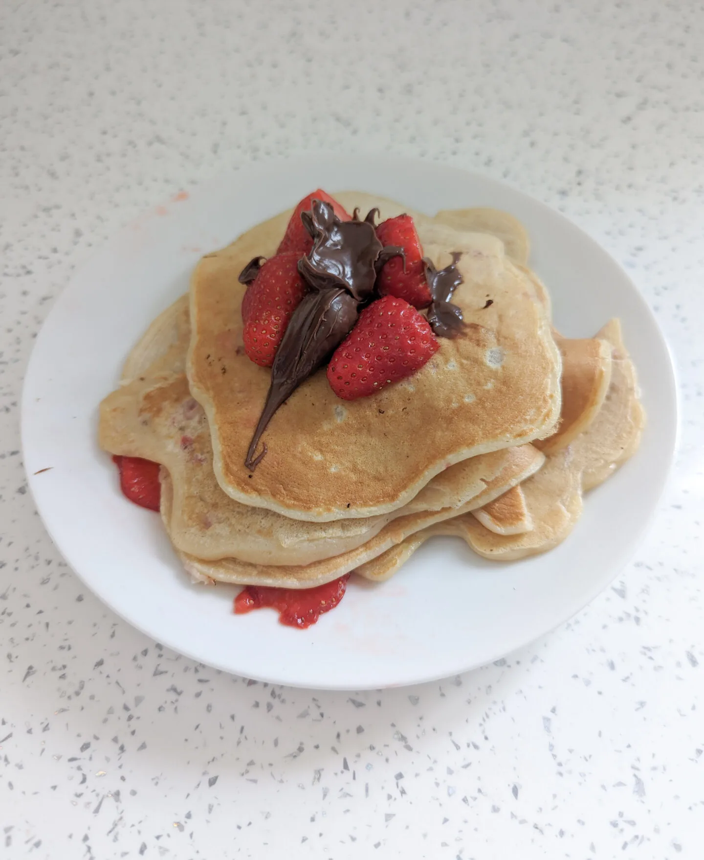 strawberry pancakes with chocolate on top